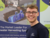  Man working in marketing standing in front of advertising banner about rainwater harvesting  