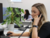  Woman providing phone support for a rainwater harvesting system  