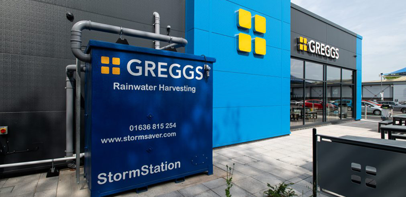 a commercial rainwater harvesting system installed in a Greggs UK store.