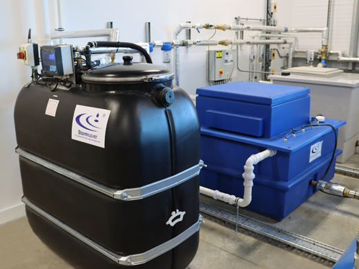 An installed greywater recycling and rainwater harvesting system in a plant room in the uk