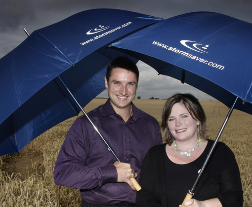 Stormsaver 2003 PR images. Lisa and Michael under an umbrella