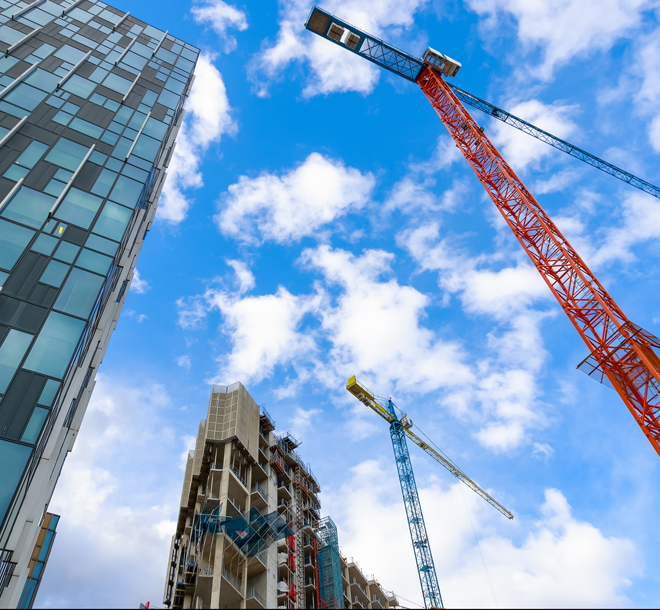 A crane and construction occurring on a building site