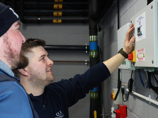 Rainwater harvesting engineer with a customer