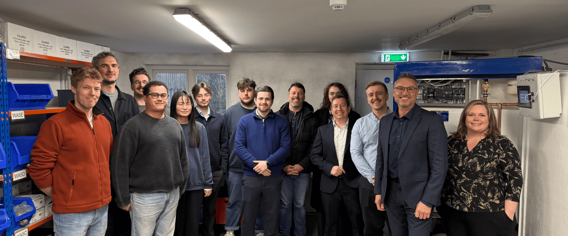 Visitors from the department for environment food and rural affairs in the stormsaver hq factory