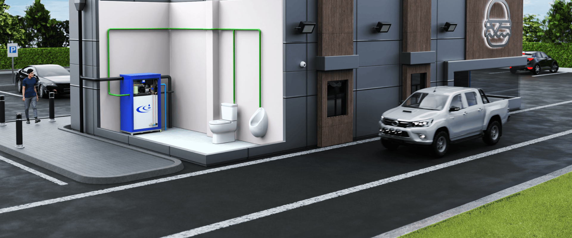 a diagram showing a small commercial rainwater harvesting system in a drive thru building