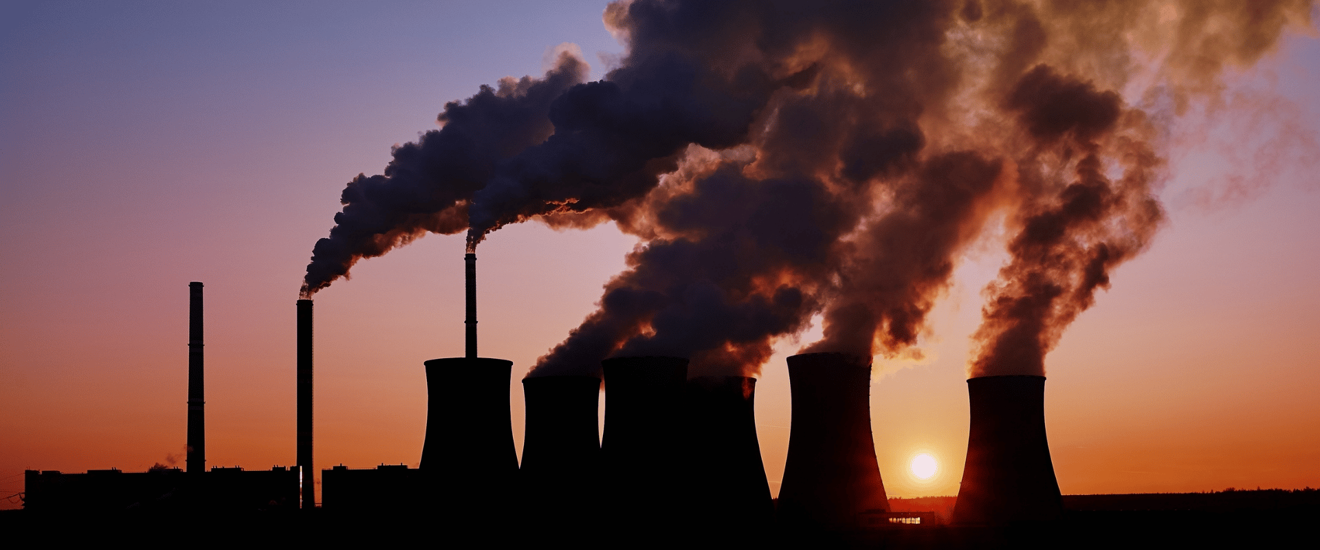 an image showing smokey chimneys which is impacting climate change and water reuse being part of the answer